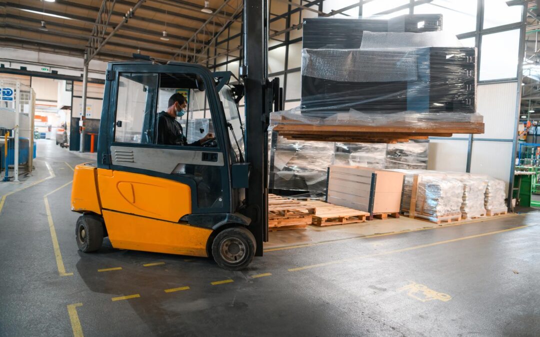 Forklift loader in storage warehouse ship yard. Distribution products. Delivery. Logistics. Transportation. Business background