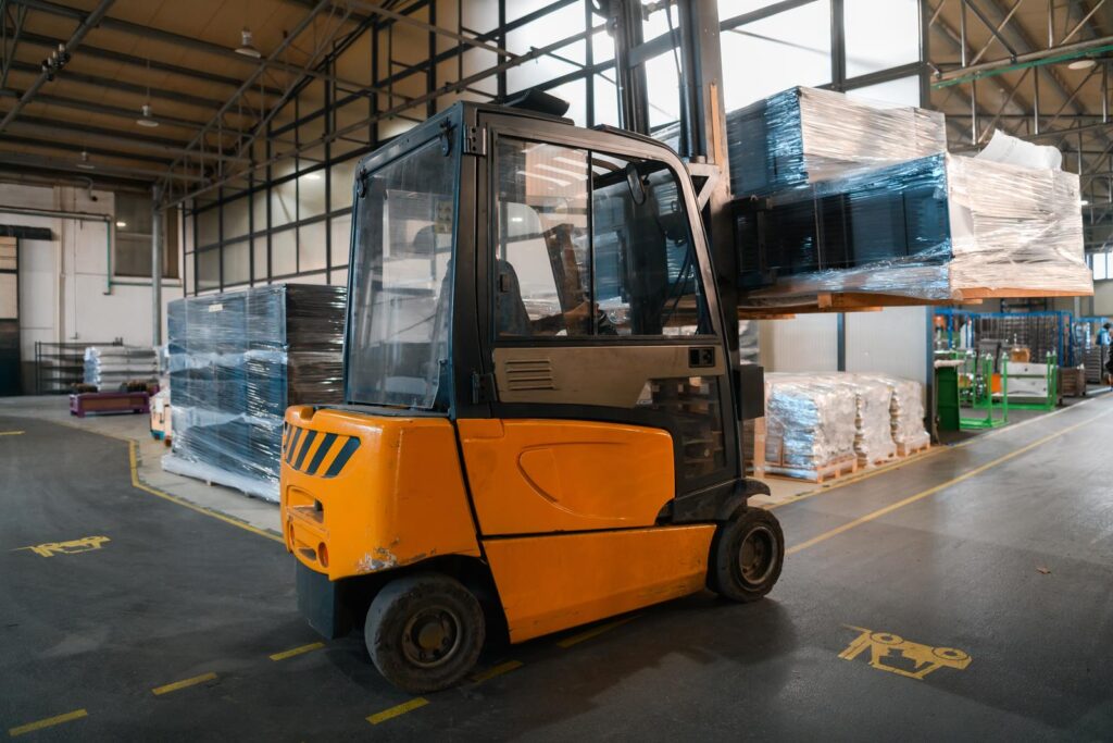 Forklift loader in storage warehouse shipyard. Distribution products. Delivery. Logistics. Transportation. Business background. High quality photo